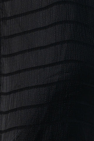 Close up of One Fell Swoop Raven fabric showing textured woven stripe detail, subtle crinkle texture and soft lustre.