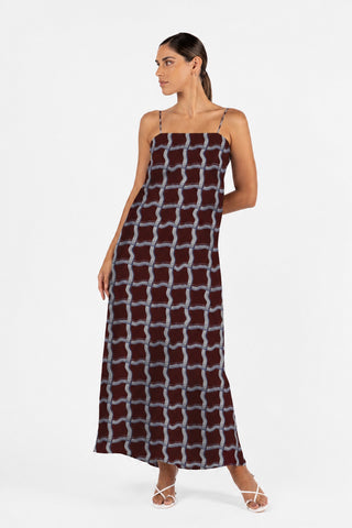 Side view of the One Fell Swoop Duplicity Slip in the exclusive Vesna print showcasing its relaxed bias-cut silhouette and fluid movement.