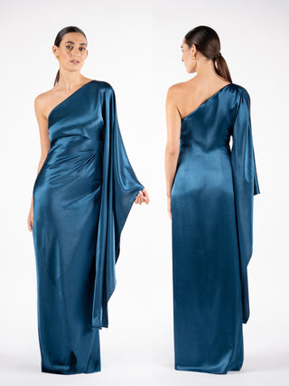 One Fell Swoop Arc Maxi in Caspian featuring an asymmetric one shoulder neckline and cascading single sleeve, blue satin maxi gown.