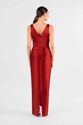 One Fell Swoop Galia Maxi in Carmine, back view of the deep red satin gown, showing the V-shaped back neckline, the fitted waist seam, the centre back seam running down the slim column skirt and the split at the hem.