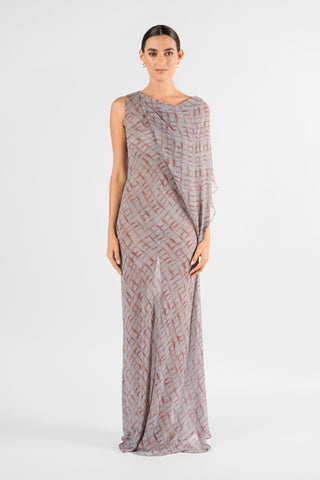 One Fell Swoop Glinch Gown in Ink Veil, straight-on front view of the sheer chiffon gown, showing the round cowl neckline, the lightweight panel draping down one side of the bodice, the grey and rust-red lattice print and the slim skirt with a soft flare at the hem.