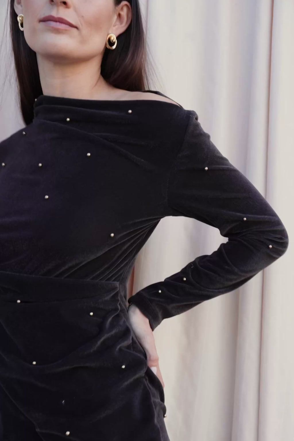 Video of Kat Mini in Iron Maiden by One Fell Swoop. Draped mini dress crafted in gold pearl-embellished velvet.